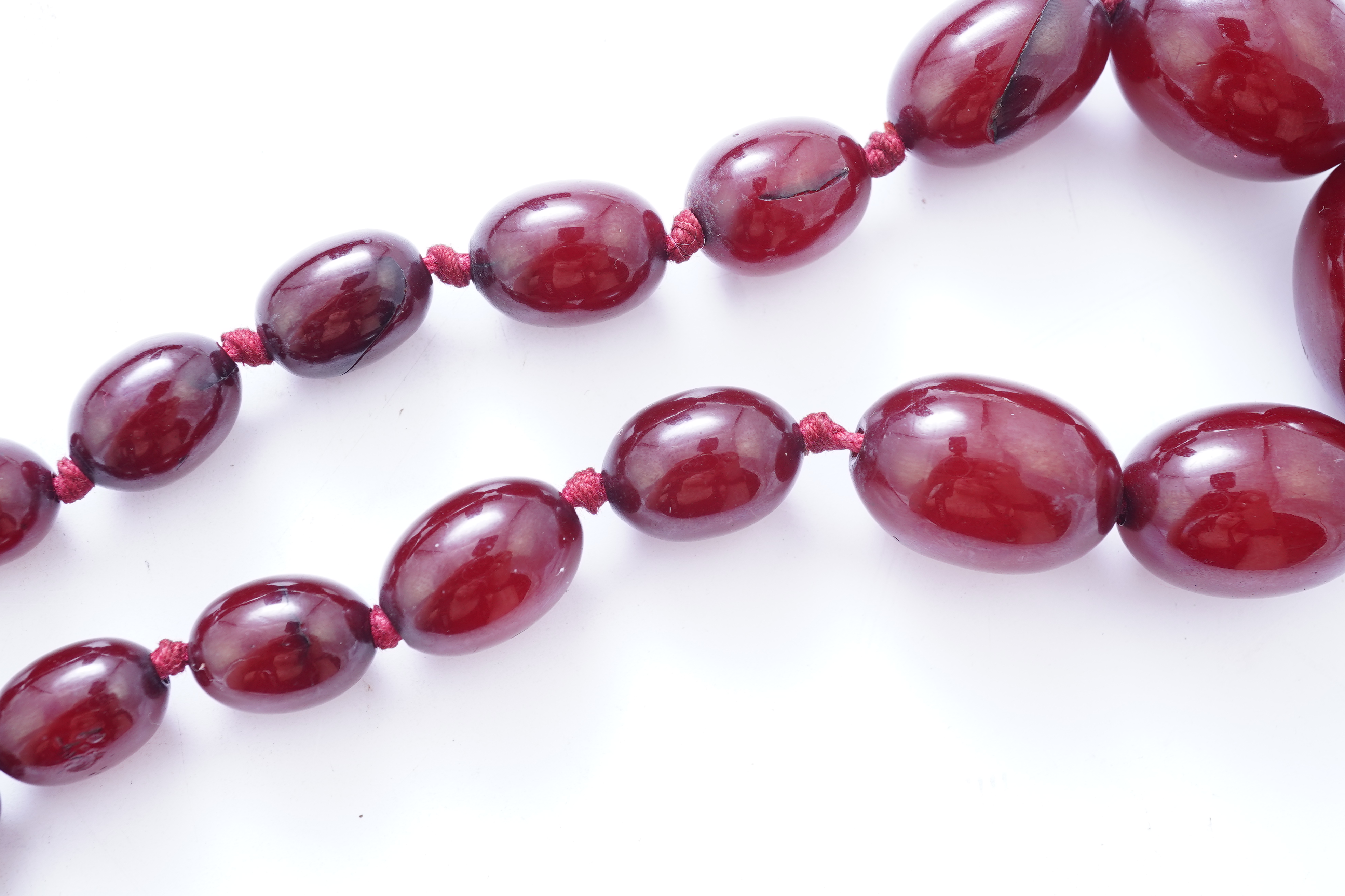 A cherry bakelite 'amber' necklace